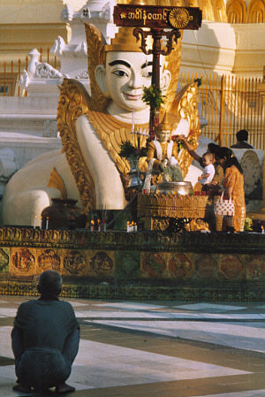 Religious ritual and praying old man