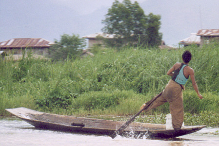 Leg-rowing fisherman