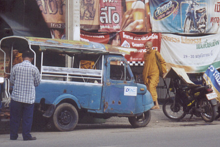 Tuk-tuk and monk